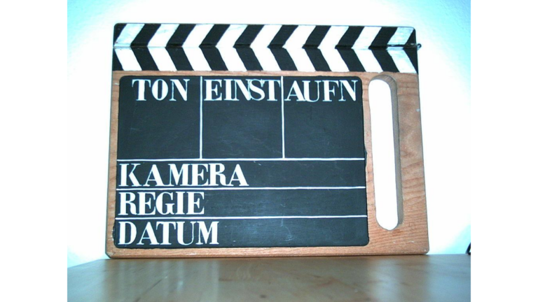 Eine Filmklappe, die auf den Filmboom in Görlitz hinweist. Es wird auch Görliwood genannt.