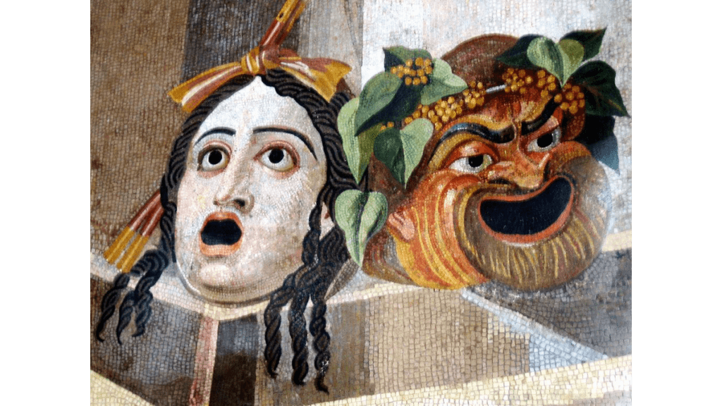 Zwei Theater Masken für die Darstellung von Tragik und Komik auf einem römischen Mosaik.